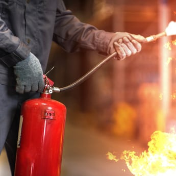 fire extinguisher using on fire